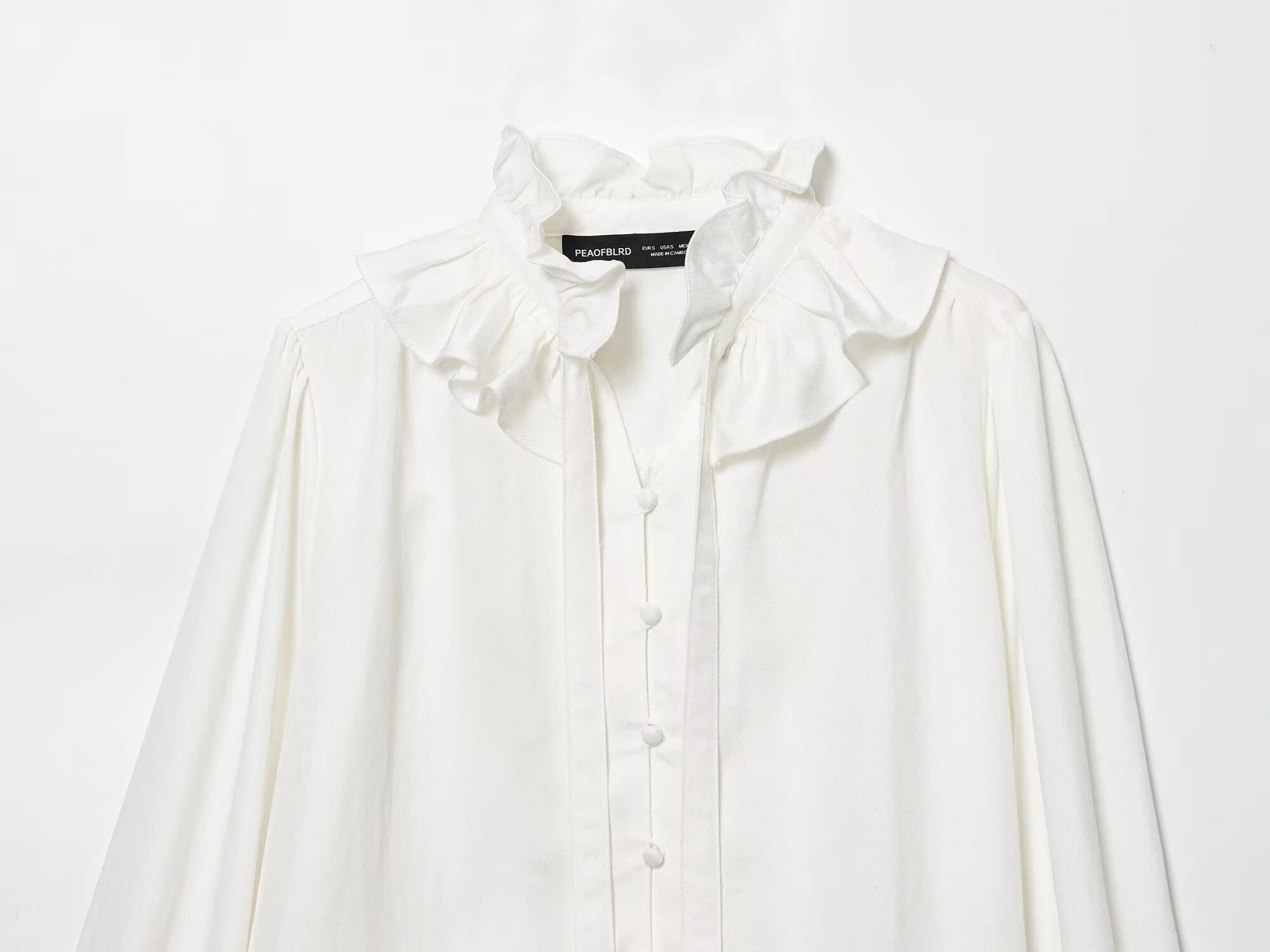 Winter new women's casual versatile temperament simple and fashionable long sleeved single breasted pleated collar top