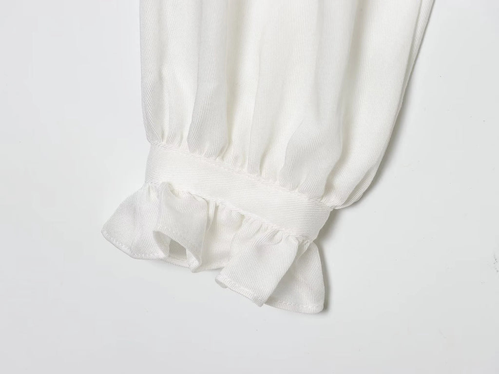 Winter new women's casual versatile temperament simple and fashionable long sleeved single breasted pleated collar top