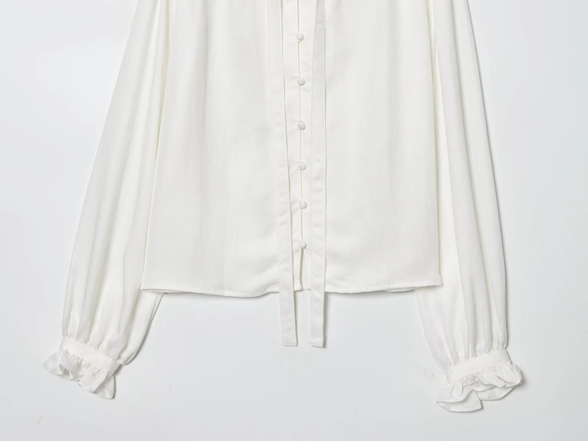 Winter new women's casual versatile temperament simple and fashionable long sleeved single breasted pleated collar top